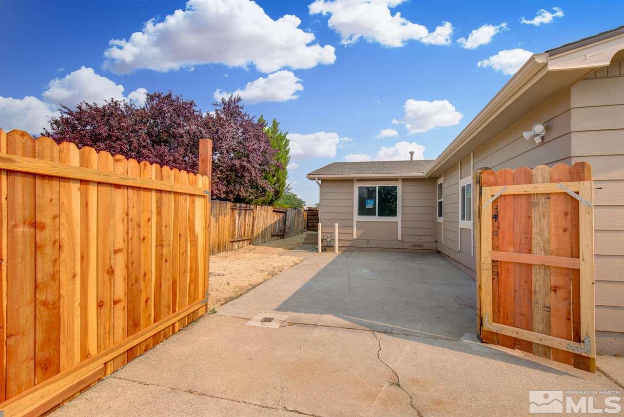 6755 Lotus Street Reno, NV 89506 - Photo 2 of 27 a view of a house with a backyard