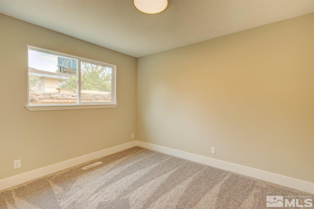 6755 Lotus Street Reno, NV 89506 - Photo 21 of 27 an empty room with a window