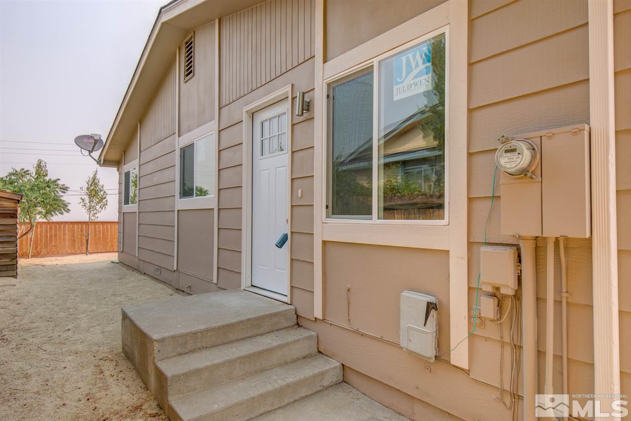 6755 Lotus Street Reno, NV 89506 - Photo 3 of 27 a view of entrance gate of building