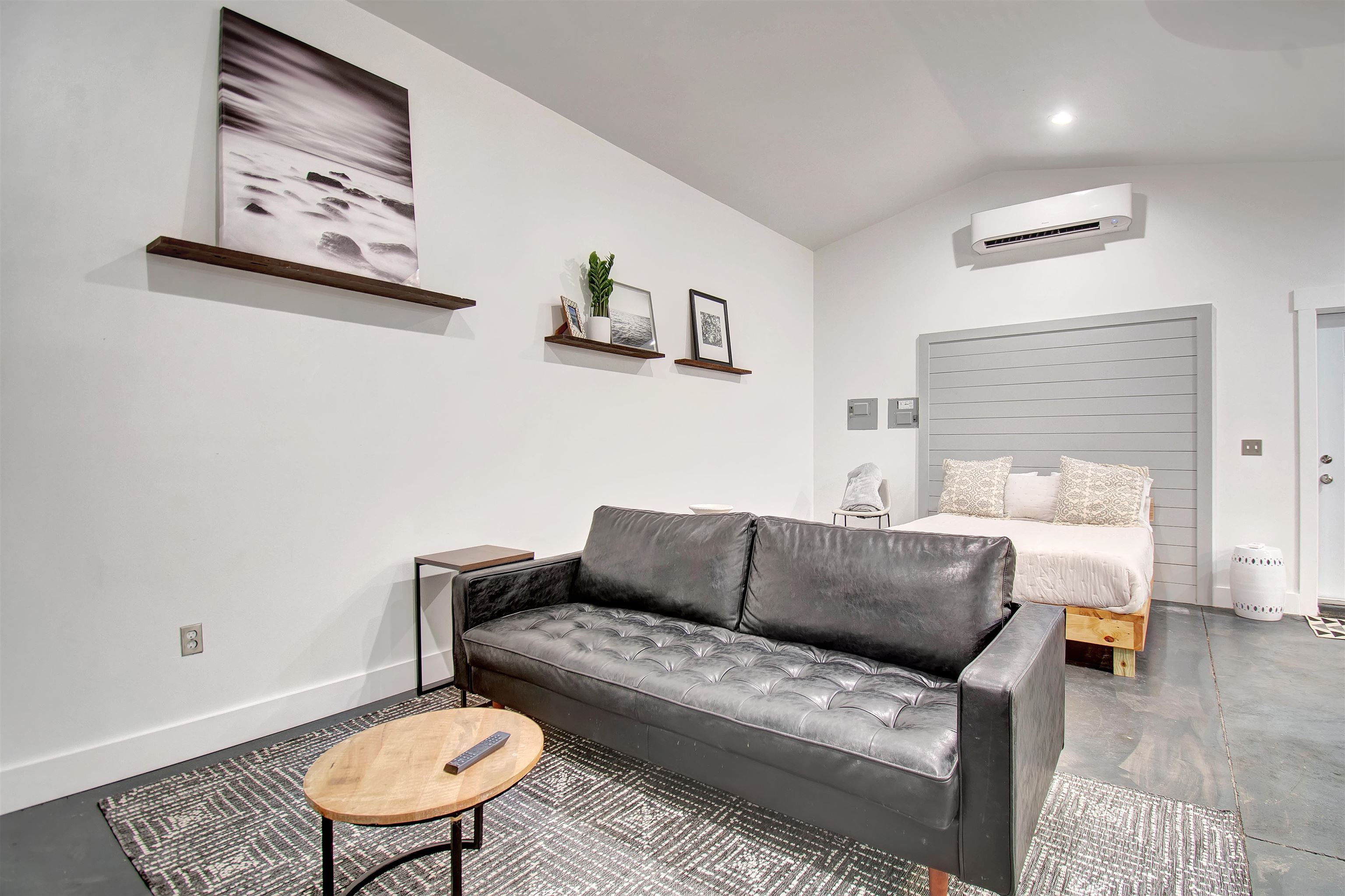103 B Evergreen Avenue, Unit B St. Augustine, FL 32084 - Photo 16 of 19 a living room with furniture and a wooden floor