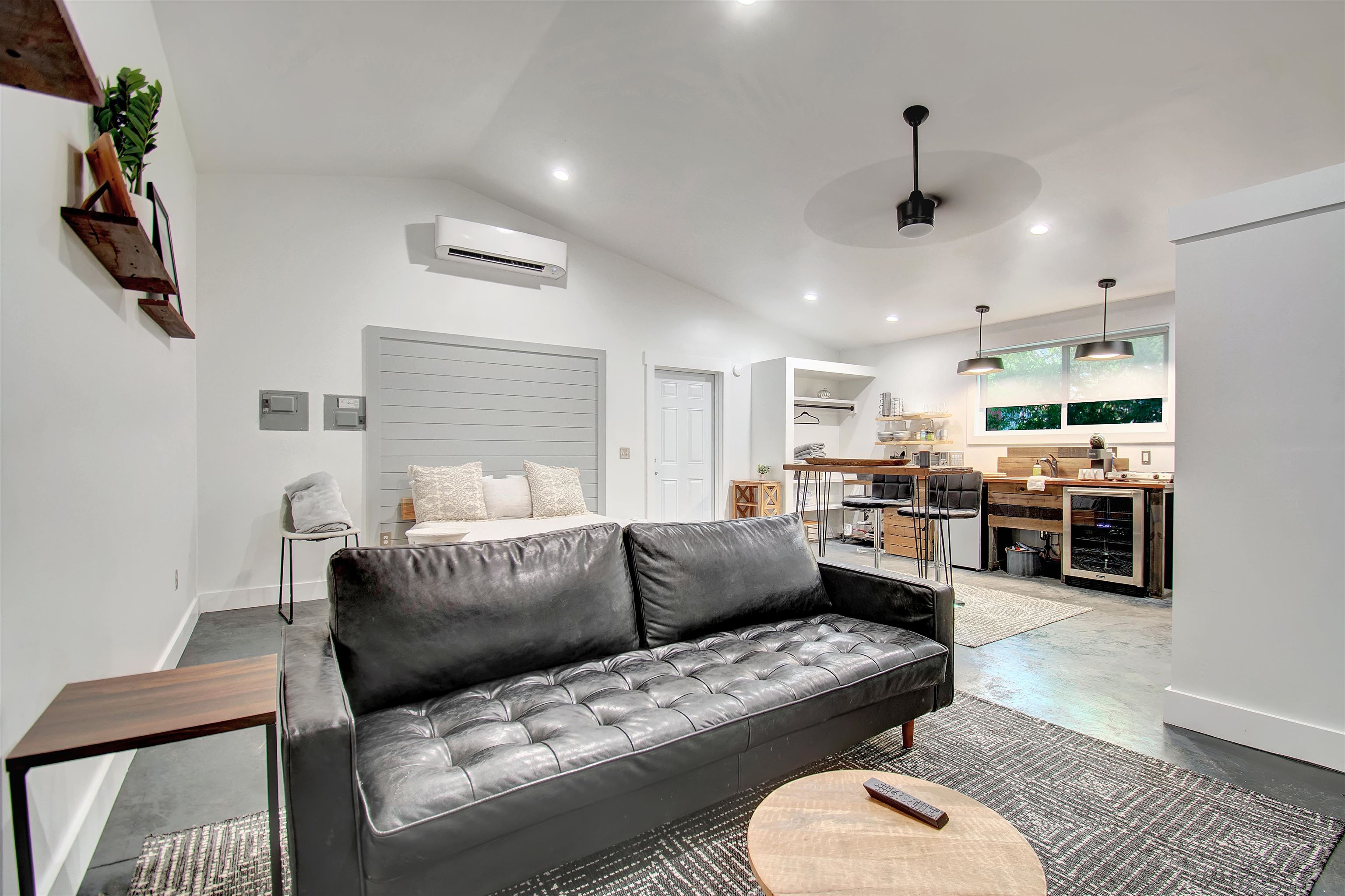 103 B Evergreen Avenue, Unit B St. Augustine, FL 32084 - Photo 4 of 19 a living room with furniture kitchen view and a couch