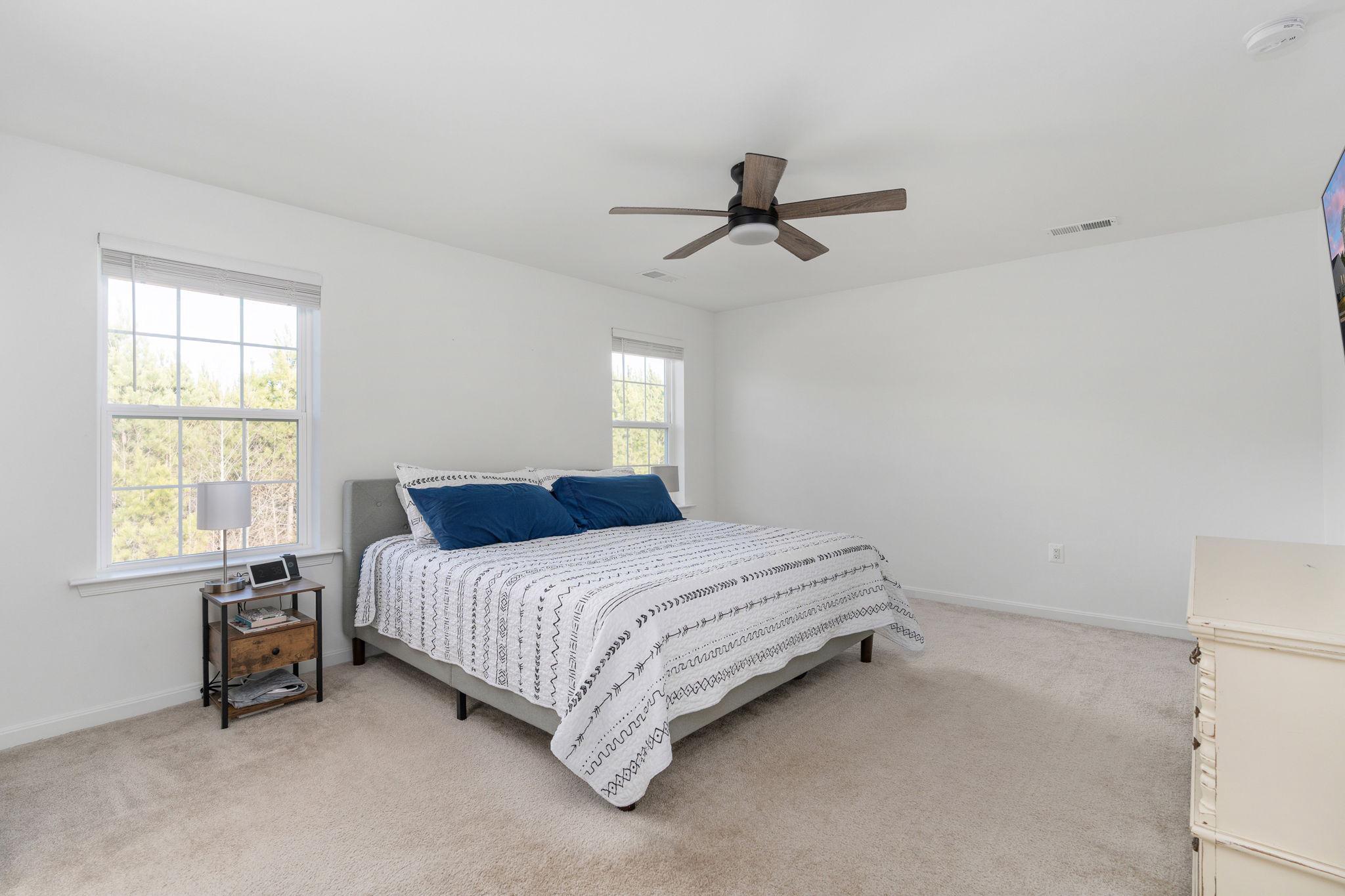 6371 Pointer Lane King George, VA 22485 - Photo 23 of 38 a bedroom with a bed and a window