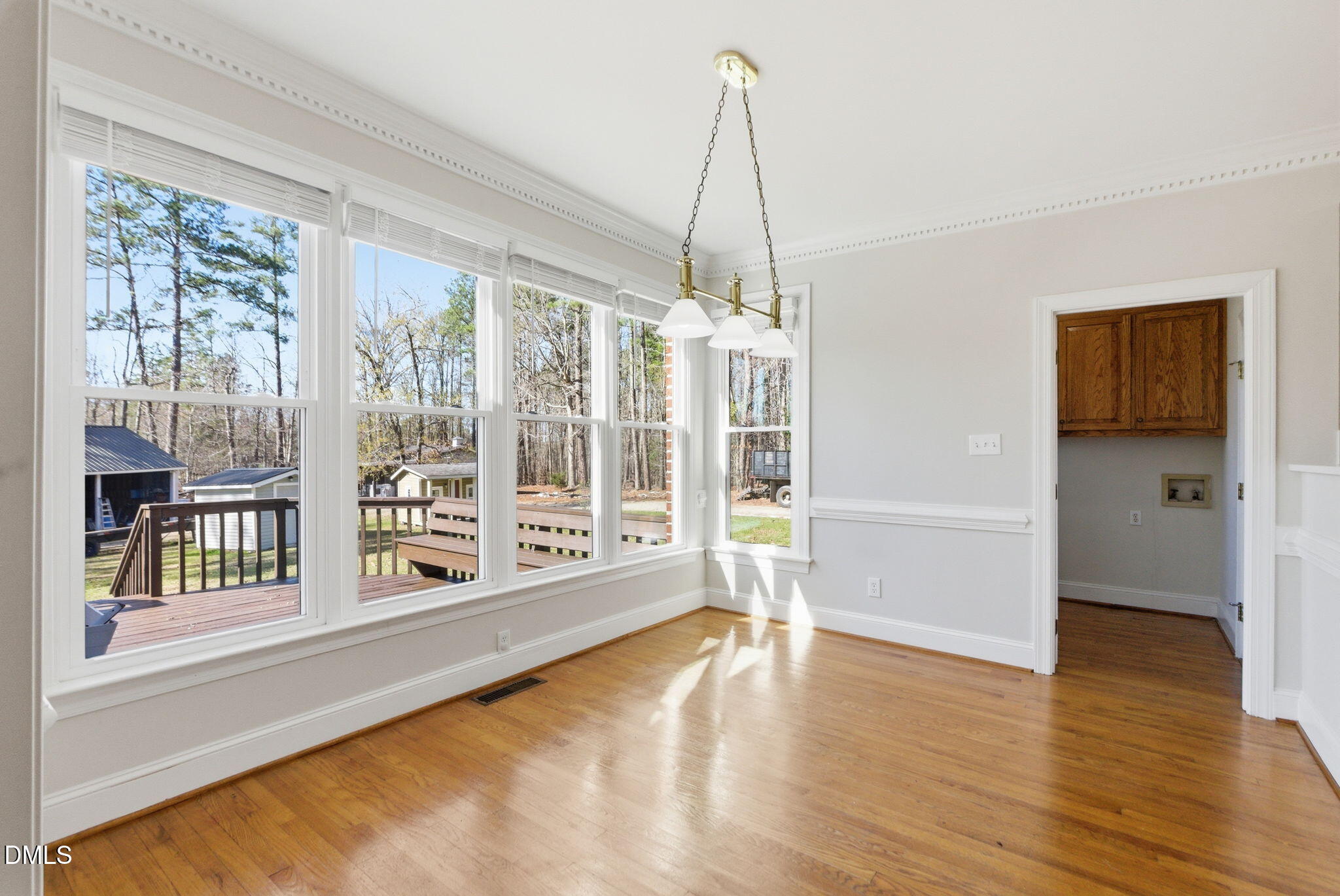 7400 Green Hope School Road Cary, NC 27519 - Photo 10 of 48 a view of a room with wooden floor and windows