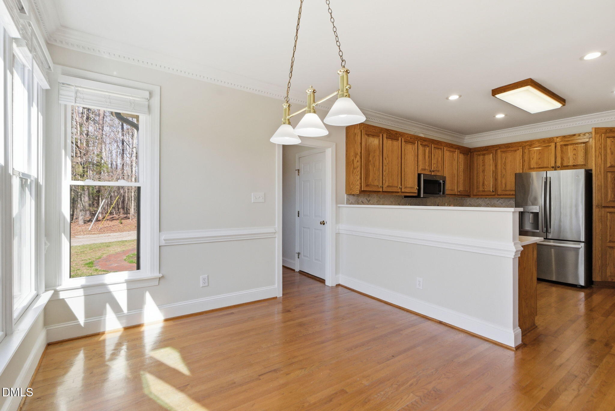 7400 Green Hope School Road Cary, NC 27519 - Photo 11 of 48 a kitchen with stainless steel appliances a refrigerator sink and microwave