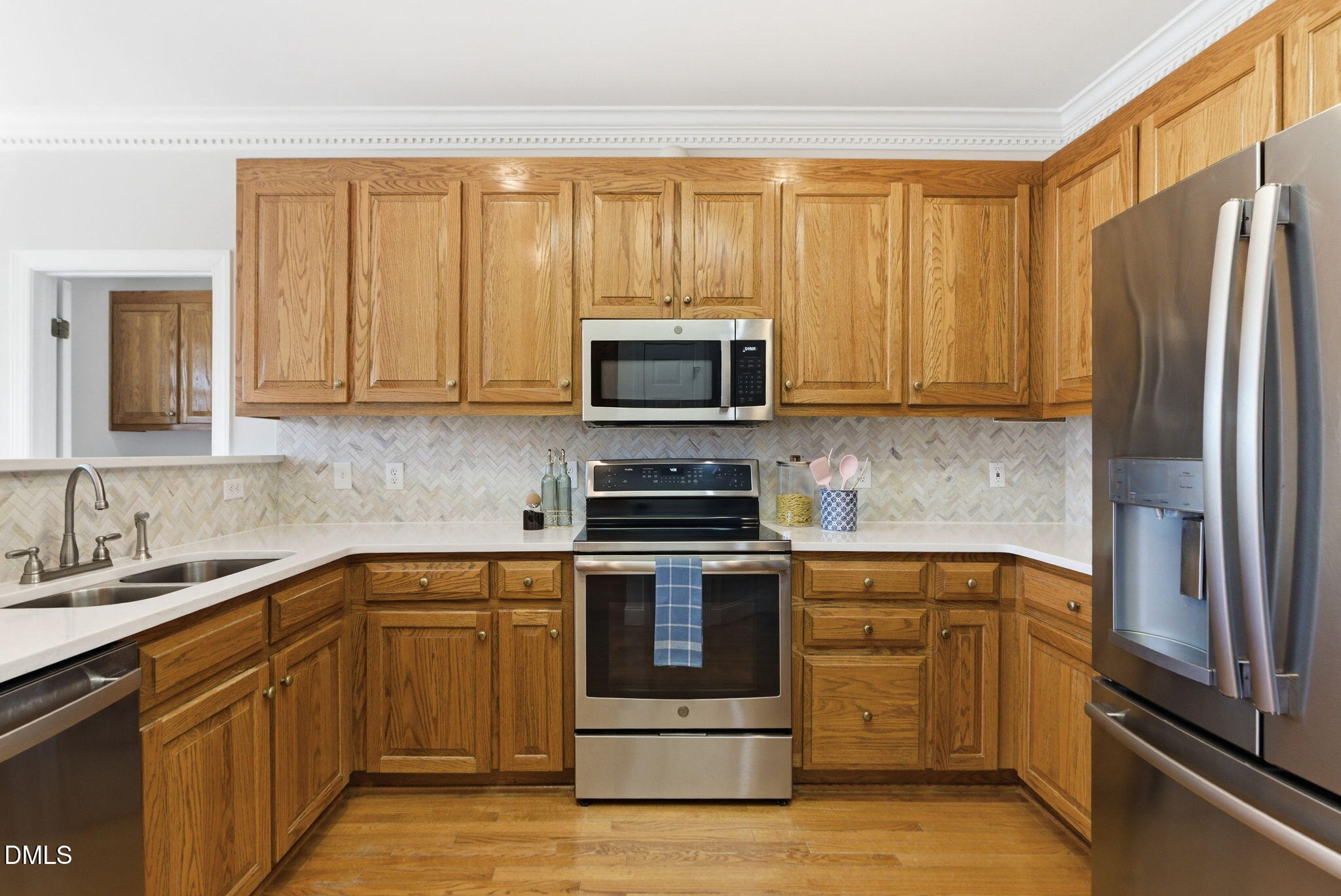 7400 Green Hope School Road Cary, NC 27519 - Photo 13 of 48 a kitchen with a sink stove and microwave