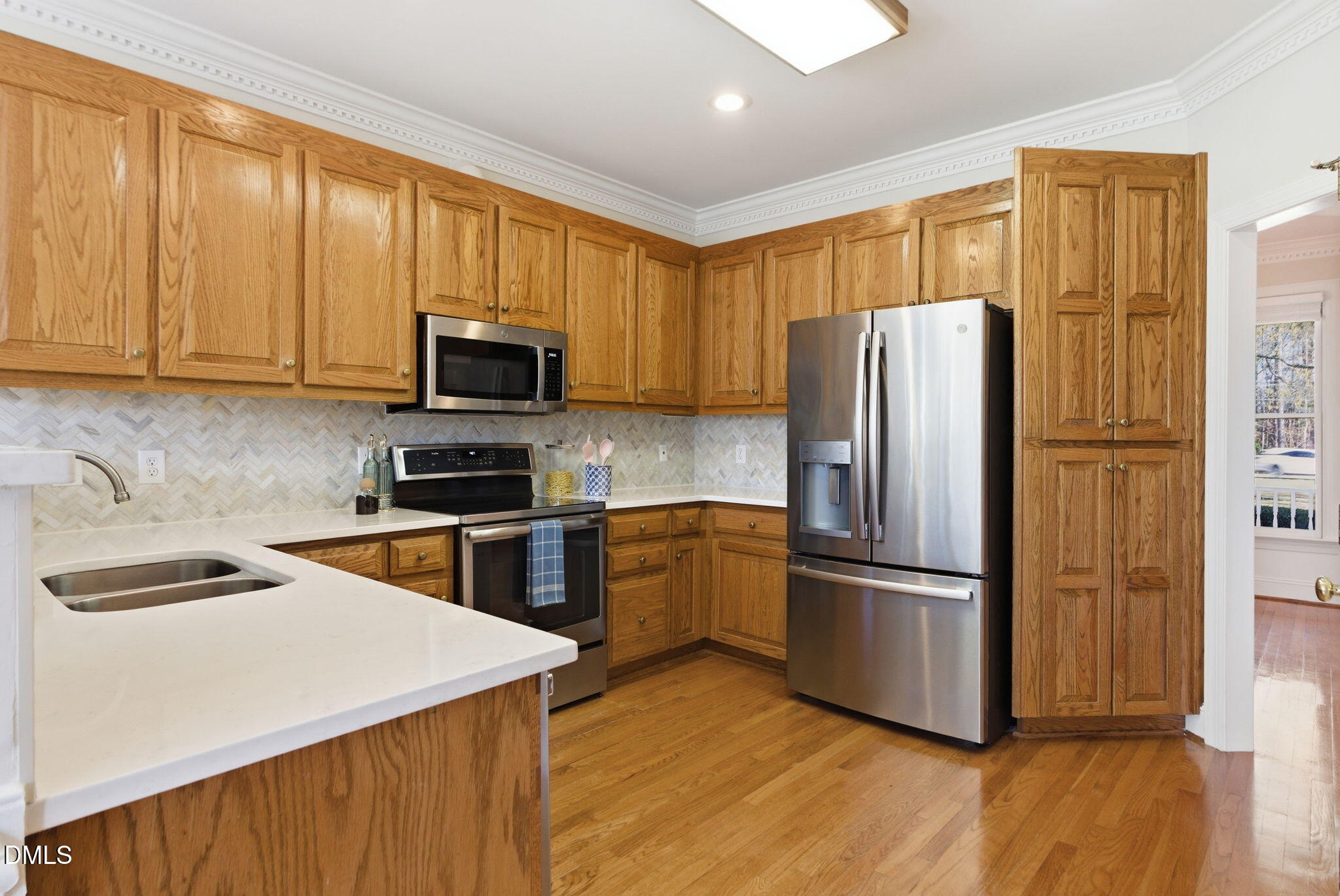 7400 Green Hope School Road Cary, NC 27519 - Photo 14 of 48 a kitchen with a refrigerator sink and microwave
