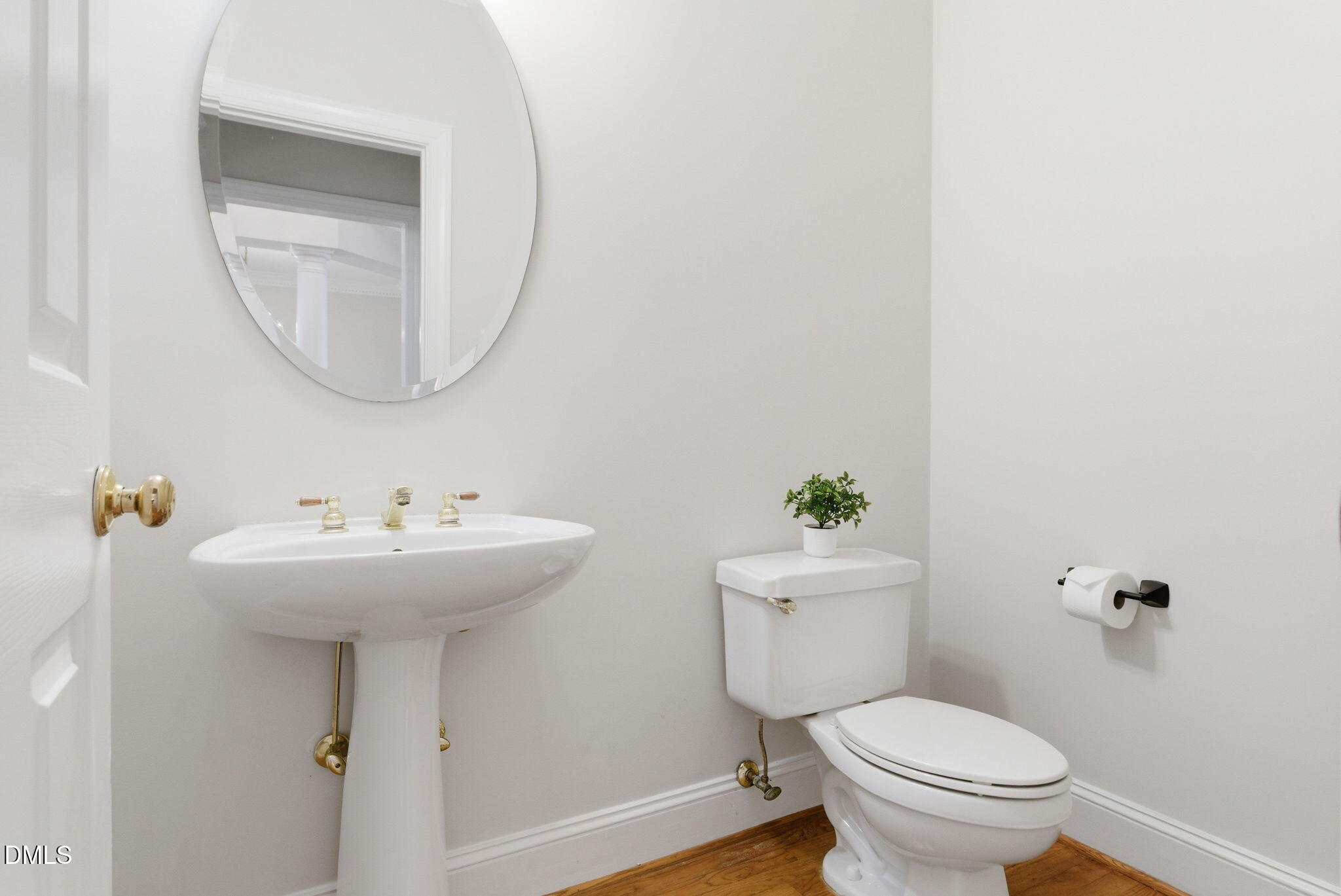 7400 Green Hope School Road Cary, NC 27519 - Photo 23 of 48 a bathroom with a sink a toilet and a mirror