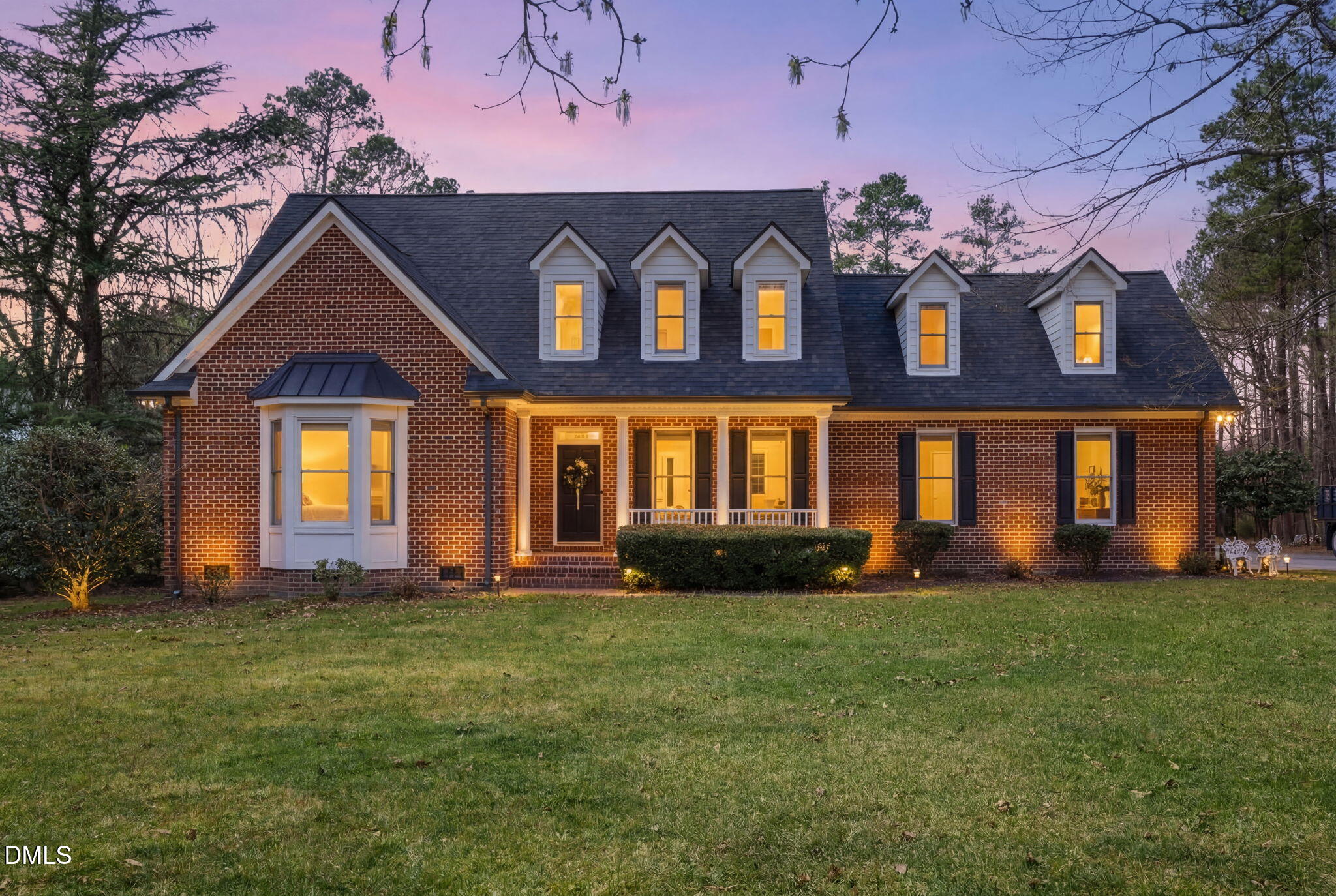 7400 Green Hope School Road Cary, NC 27519 - Photo 2 of 48 a front view of house with yard and green space