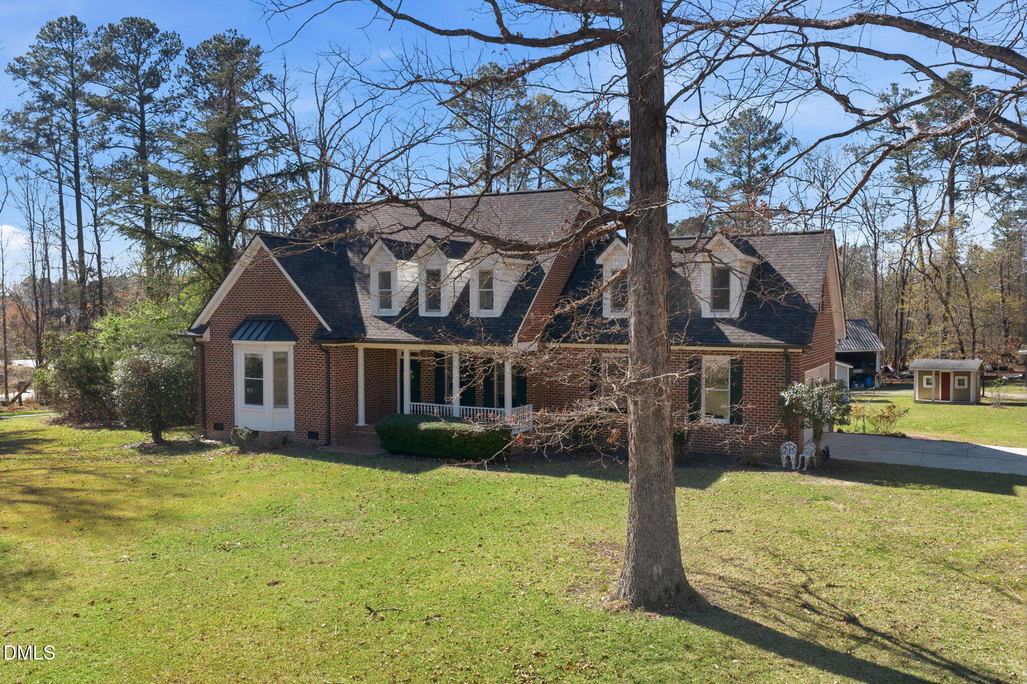 7400 Green Hope School Road Cary, NC 27519 - Photo 4 of 48 a view of a house with a yard covered in snow