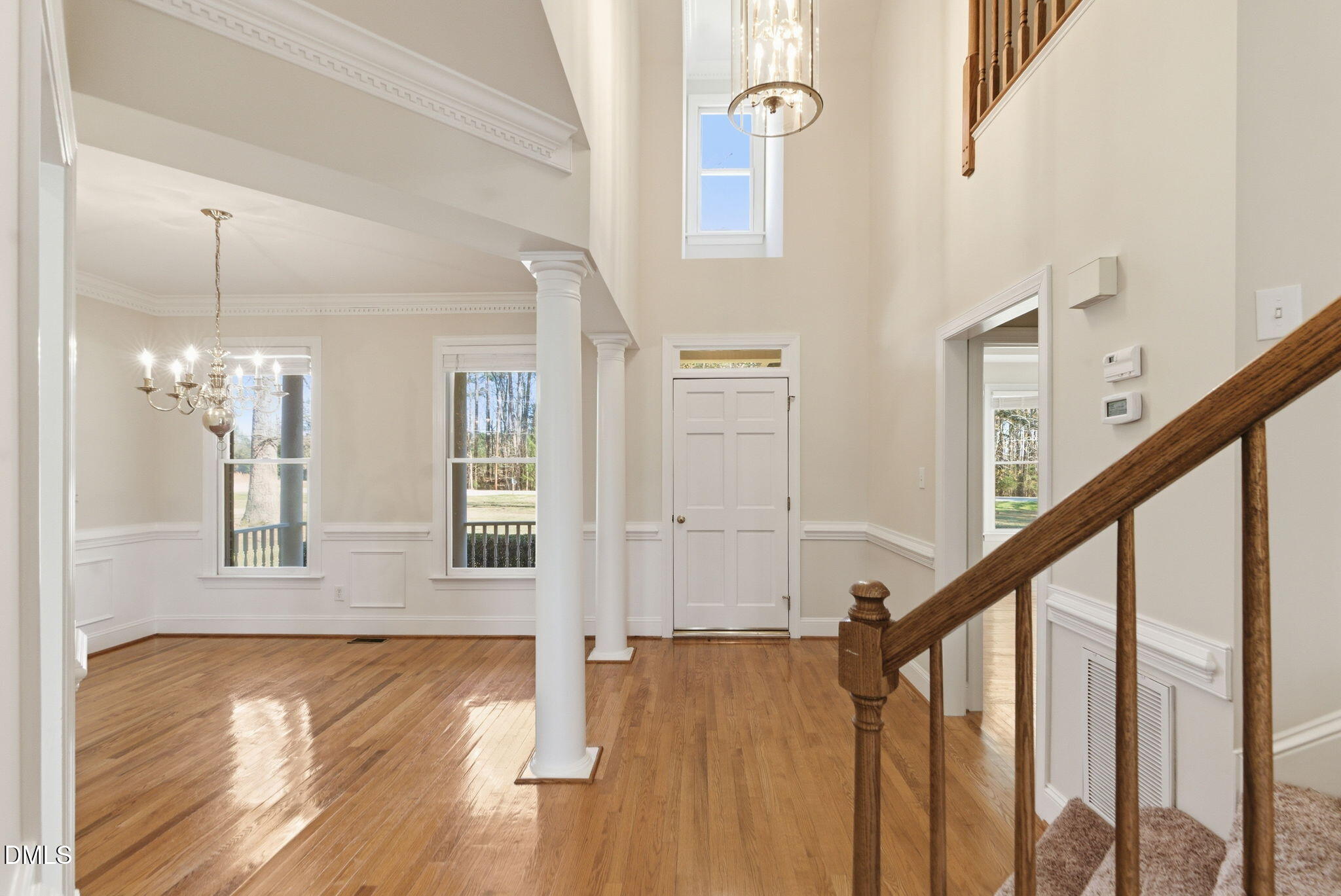 7400 Green Hope School Road Cary, NC 27519 - Photo 6 of 48 a view of an entryway with wooden floor and stairs