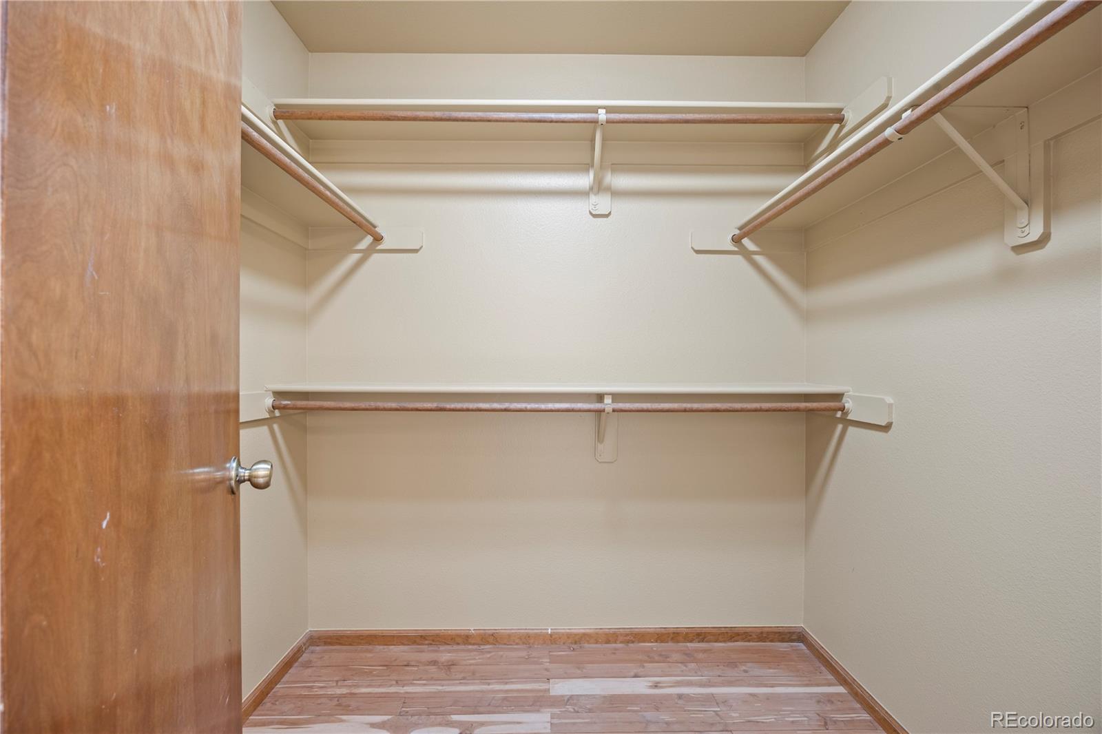 8725 Meadowlark Circle Highlands Ranch, CO 80126 - Photo 25 of 40 a view of an empty walk in closet