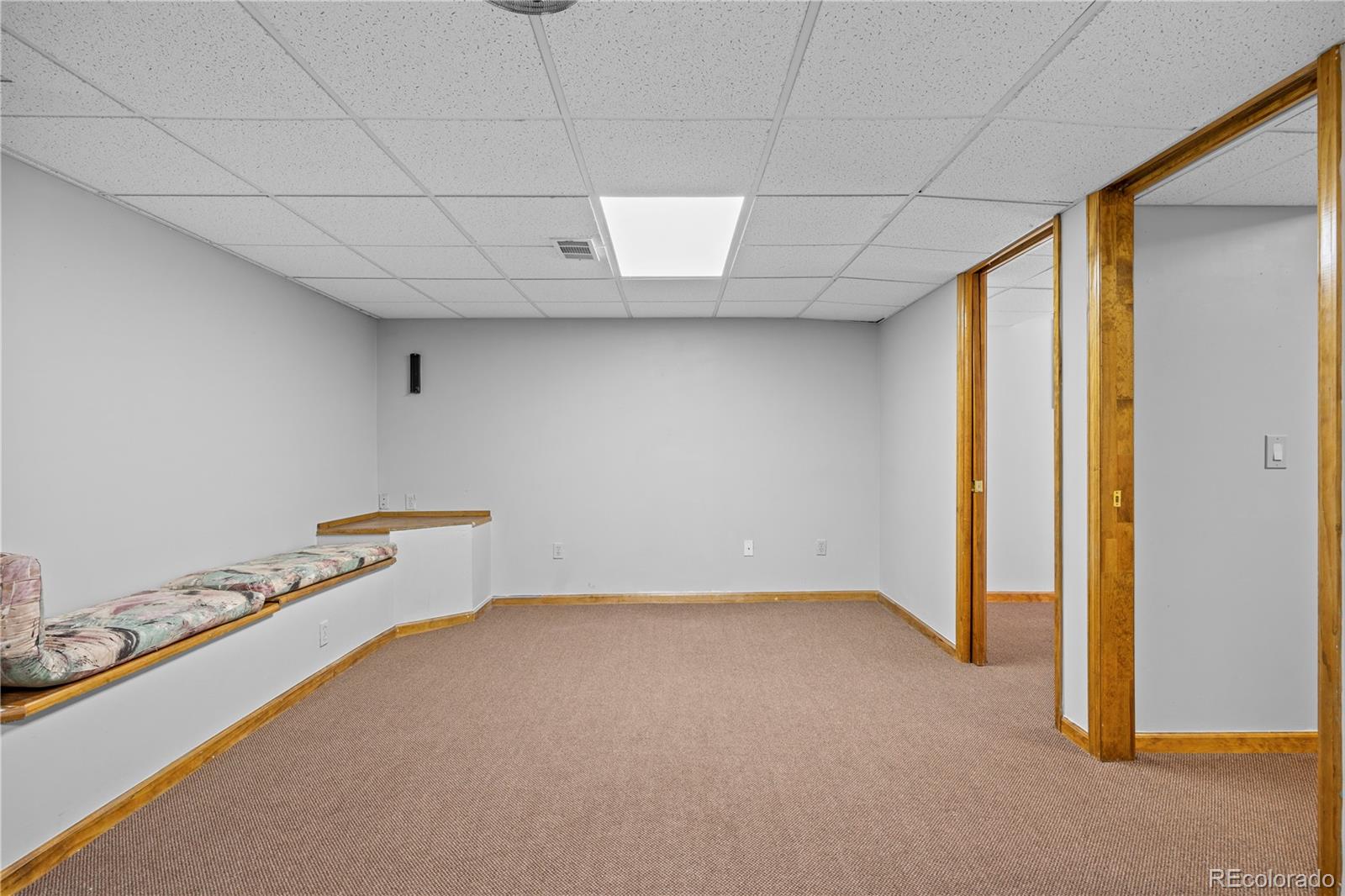 8725 Meadowlark Circle Highlands Ranch, CO 80126 - Photo 26 of 40 a view of a room with gym equipment