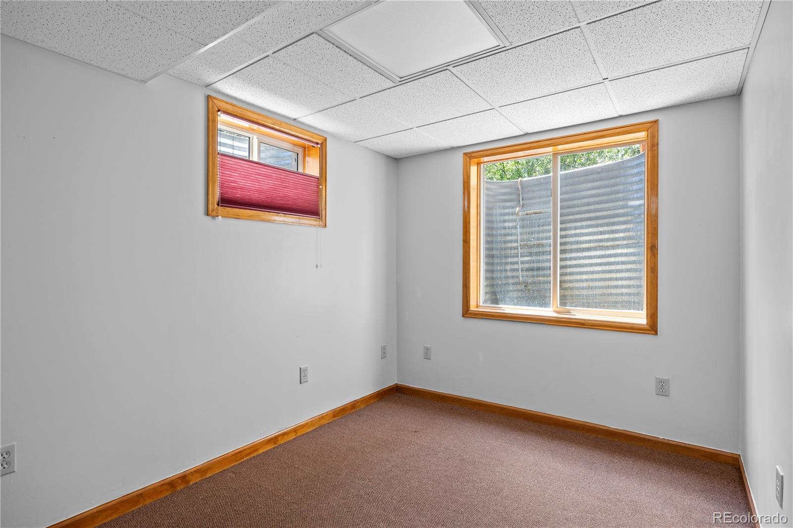 8725 Meadowlark Circle Highlands Ranch, CO 80126 - Photo 28 of 40 a view of an empty room with a window