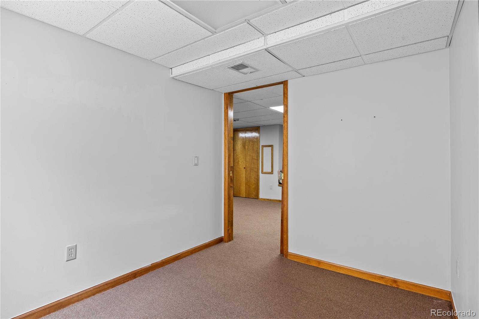 8725 Meadowlark Circle Highlands Ranch, CO 80126 - Photo 31 of 40 a view of an empty room