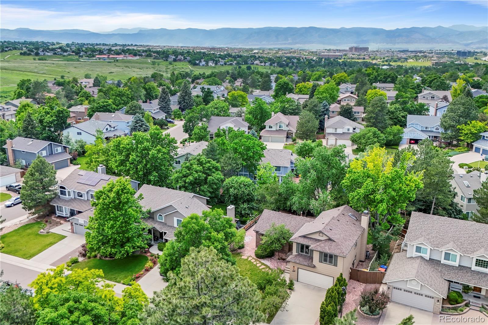 8725 Meadowlark Circle Highlands Ranch, CO 80126 - Photo 40 of 40 an aerial view of a city with lots of residential buildings
