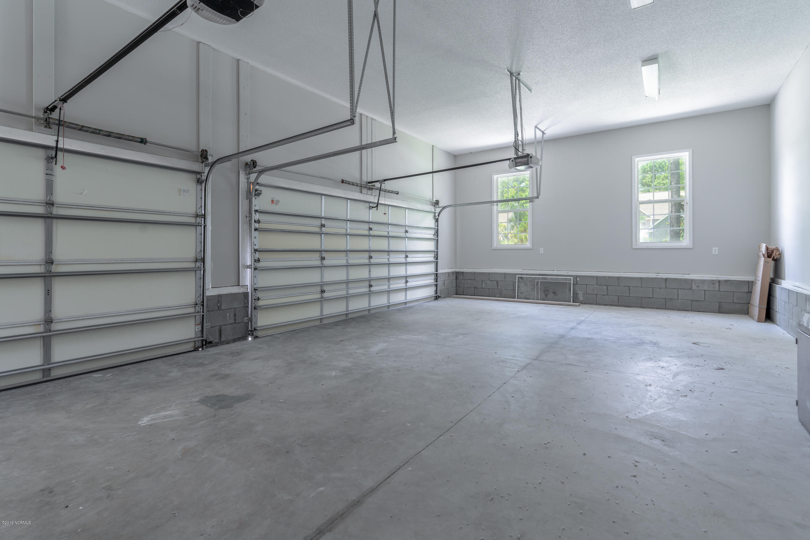 207 South Grist Mill Road Hampstead, NC 28443 - Photo 27 of 36 Three car garage