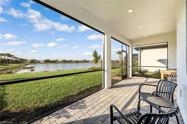 a balcony with furniture and city view