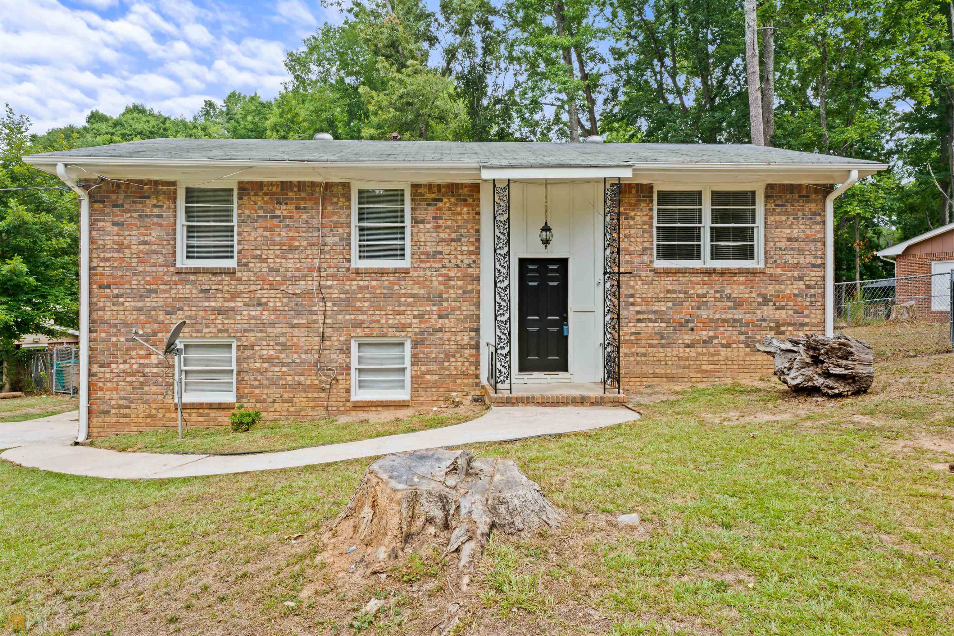 6575 Rabun Road Morrow, GA 30260 - Photo 1 of 1 a view of a house with yard