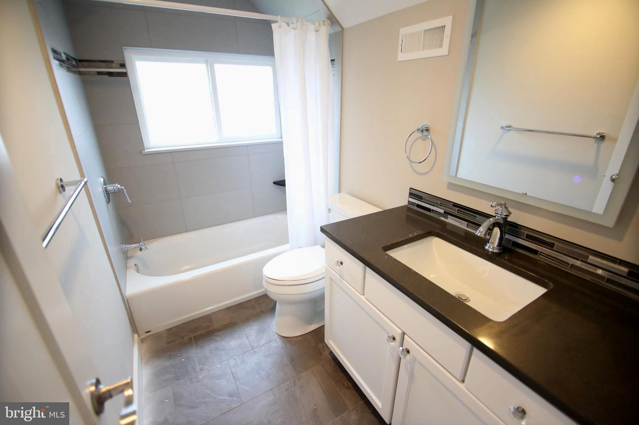33 High Road Levittown, PA 19056 - Photo 30 of 43 Upper Level Full Bath with privacy glass window