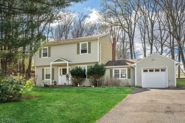front view of a house and a yard