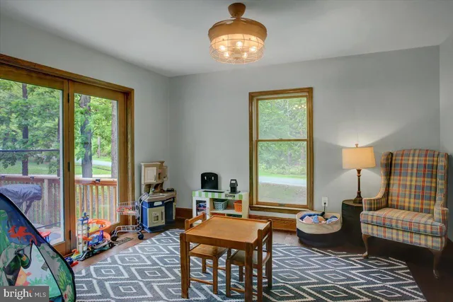 a room with furniture and a window