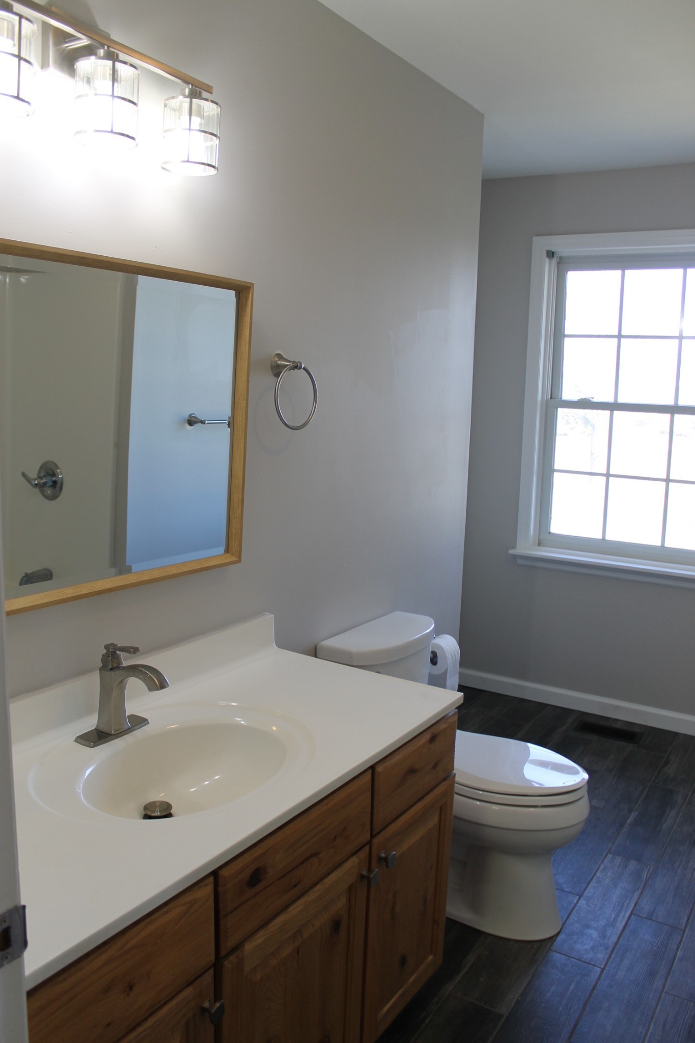 3418 Pinson School Road Springfield, TN 37172 - Photo 32 of 32 a bathroom with a sink a toilet and mirror