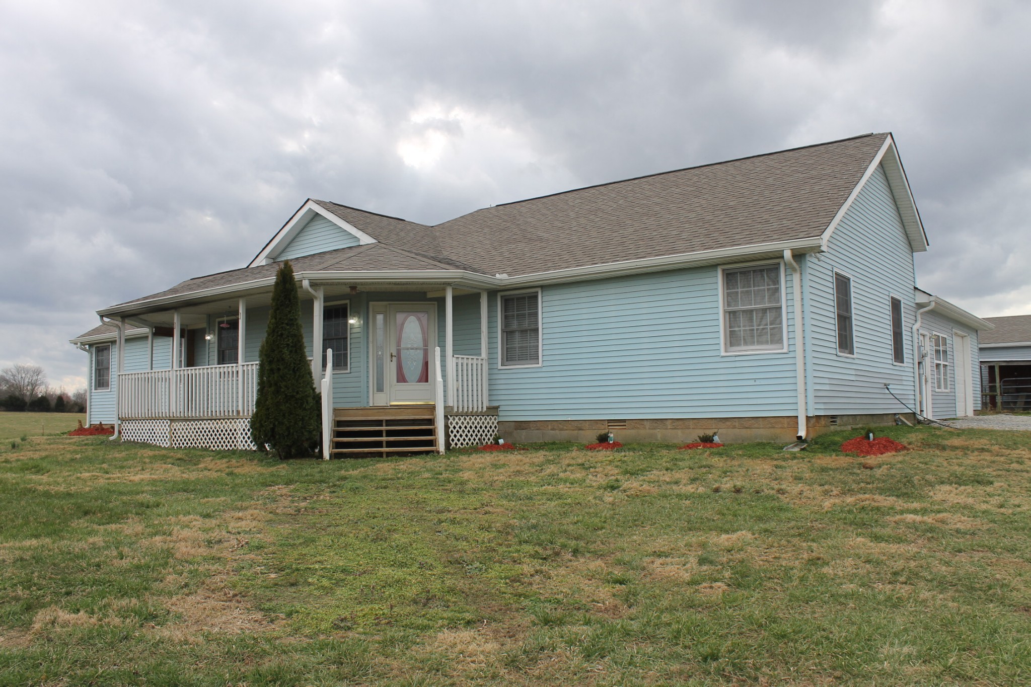 3418 Pinson School Road Springfield, TN 37172 - Photo 4 of 32 a front view of a house with a garden