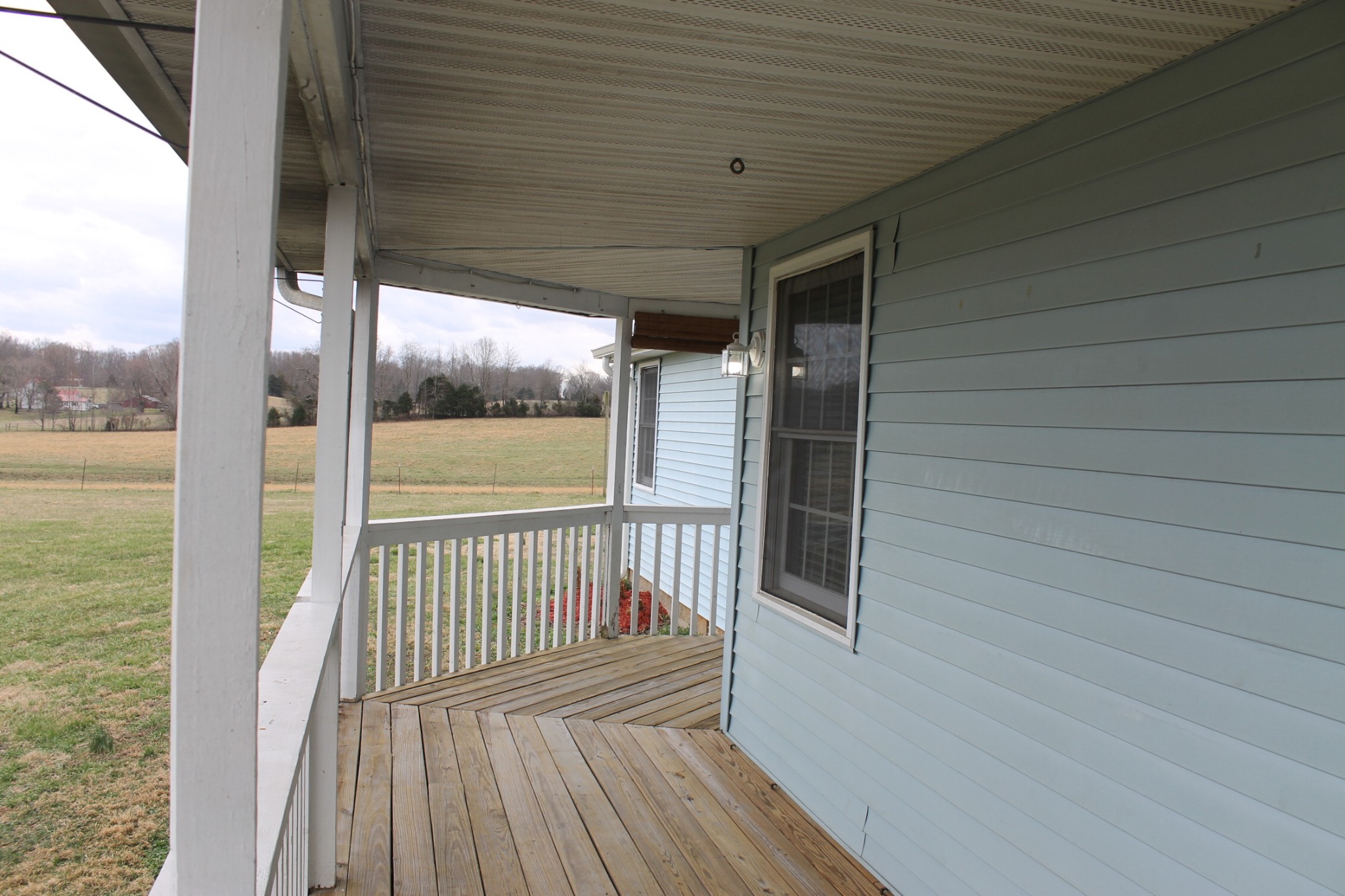 3418 Pinson School Road Springfield, TN 37172 - Photo 5 of 32 a view of a balcony with wooden floor