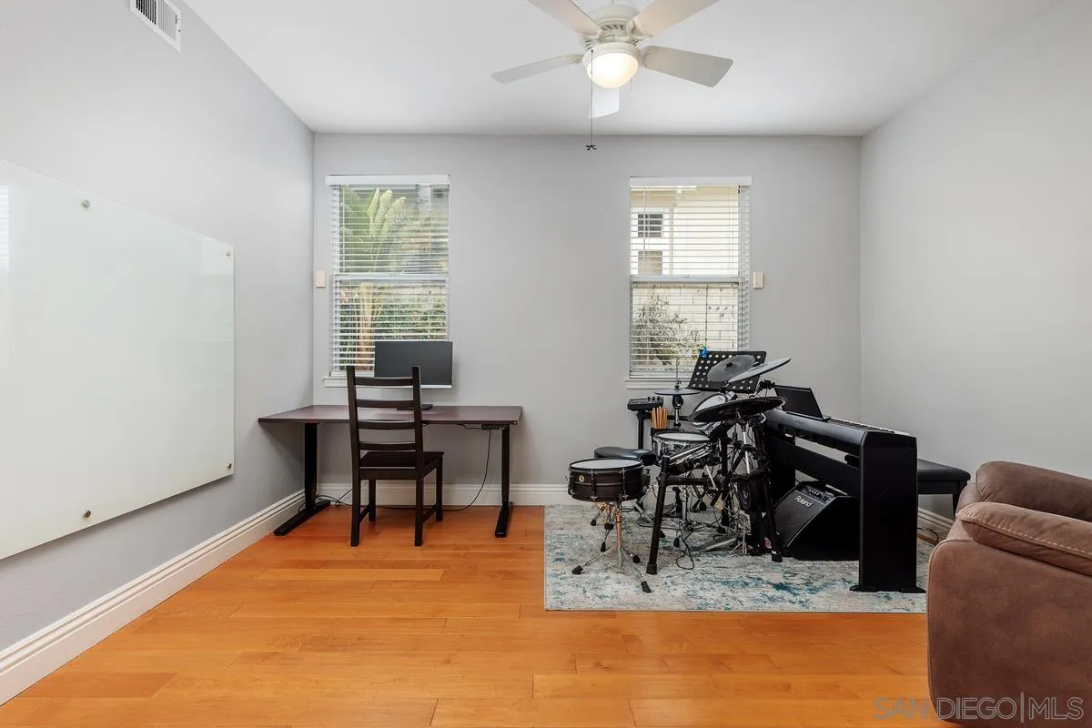 6943 Wildrose Terrace Carlsbad, CA 92011 - Photo 20 of 34 a dining room with furniture and a window