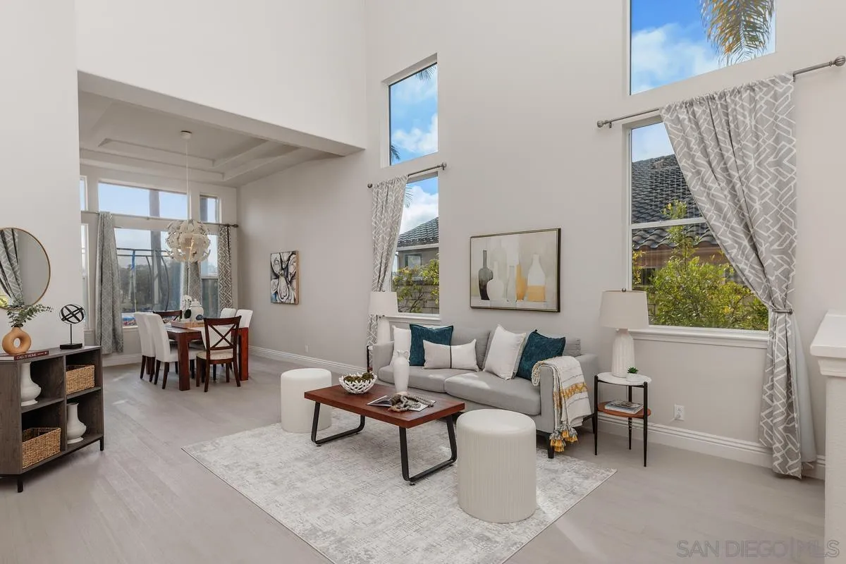 6943 Wildrose Terrace Carlsbad, CA 92011 - Photo 7 of 34 a living room with furniture and a potted plant