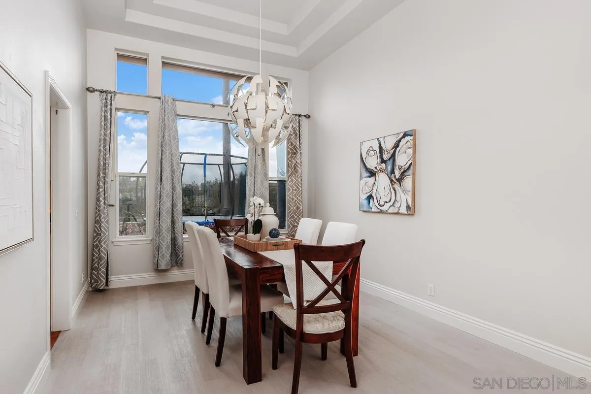 6943 Wildrose Terrace Carlsbad, CA 92011 - Photo 9 of 34 a view of a dining room with furniture and window