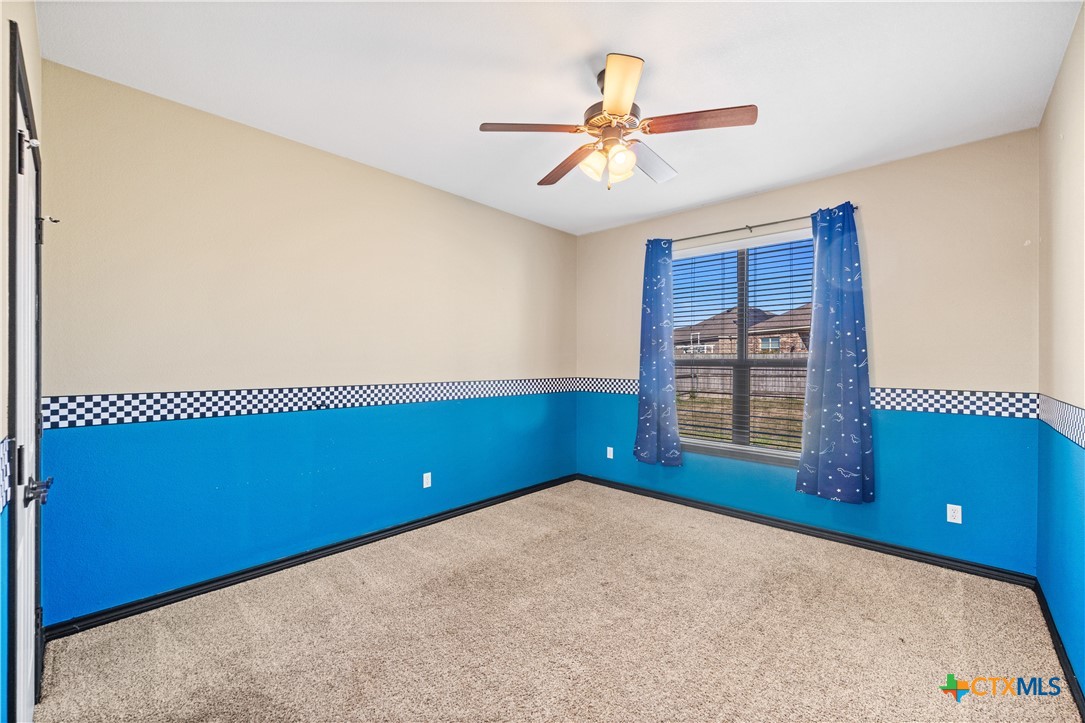 304 Jake Drive Jarrell, TX 76537 - Photo 17 of 30 a view of an empty room with a window