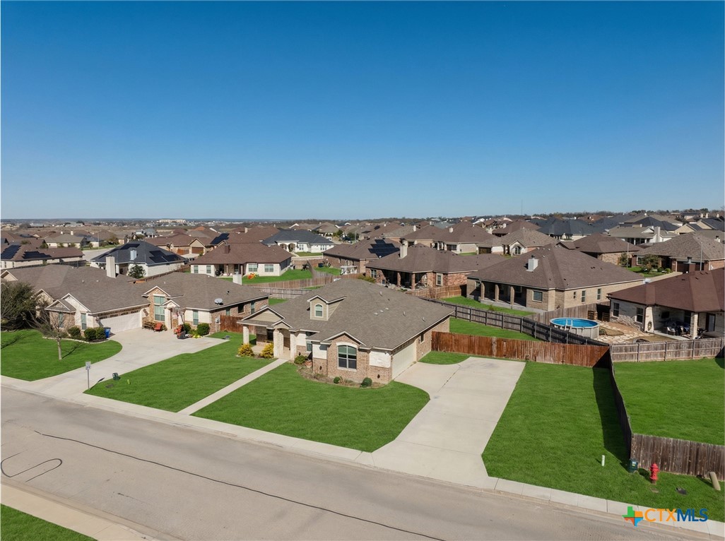 304 Jake Drive Jarrell, TX 76537 - Photo 2 of 30 an aerial view of a house with a yard
