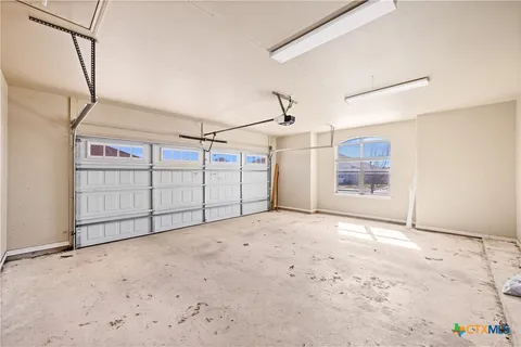 an aerial view of a house with garden
