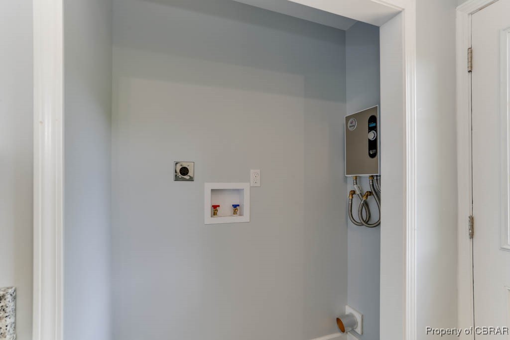 917 Chapel Neck Road North, VA 23128 - Photo 13 of 29 Laundry room featuring hookup for an electric dryer and washer hookup