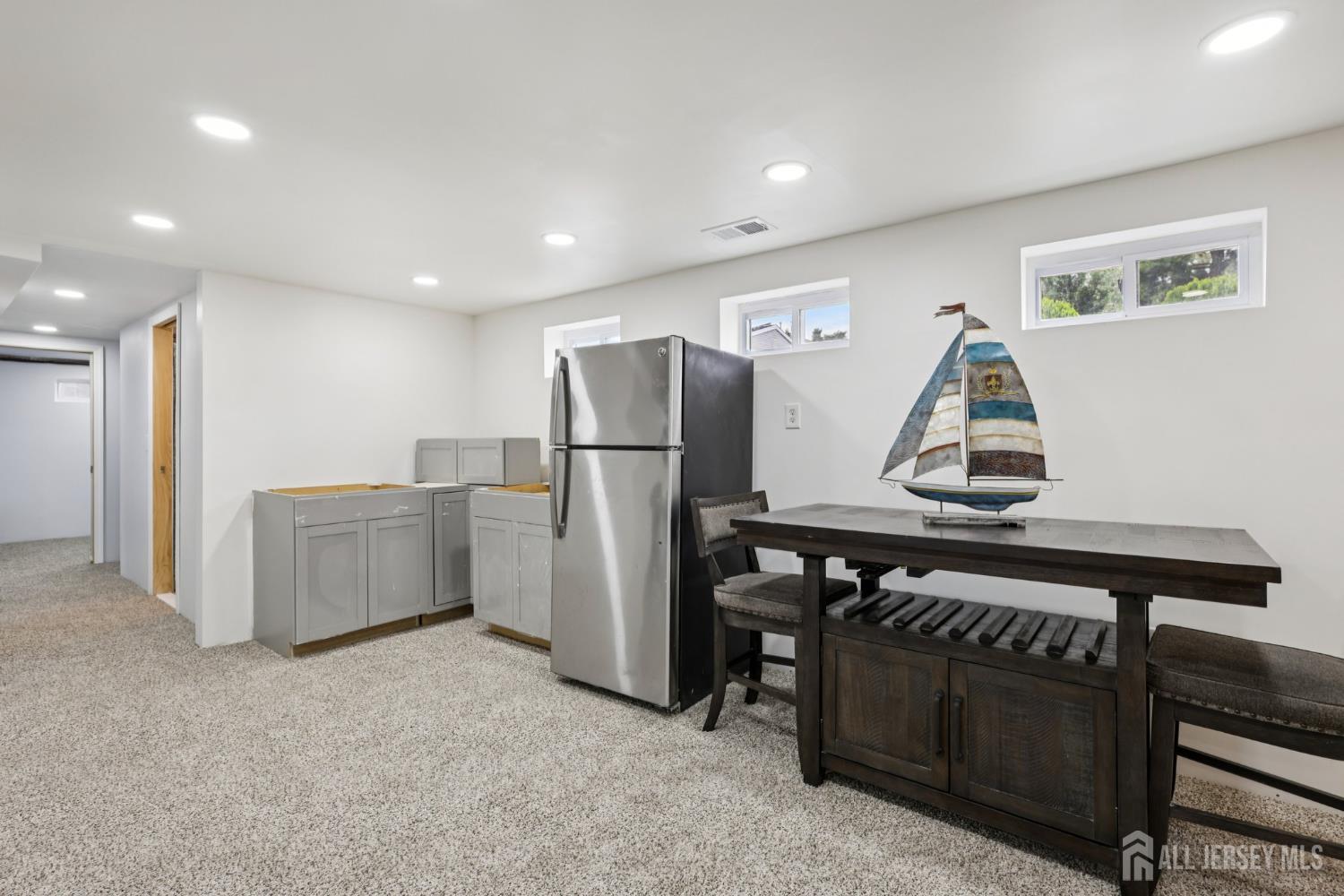 3 Duke Lane Hazlet, NJ 07730 - Photo 36 of 46 a kitchen with a refrigerator and a stove