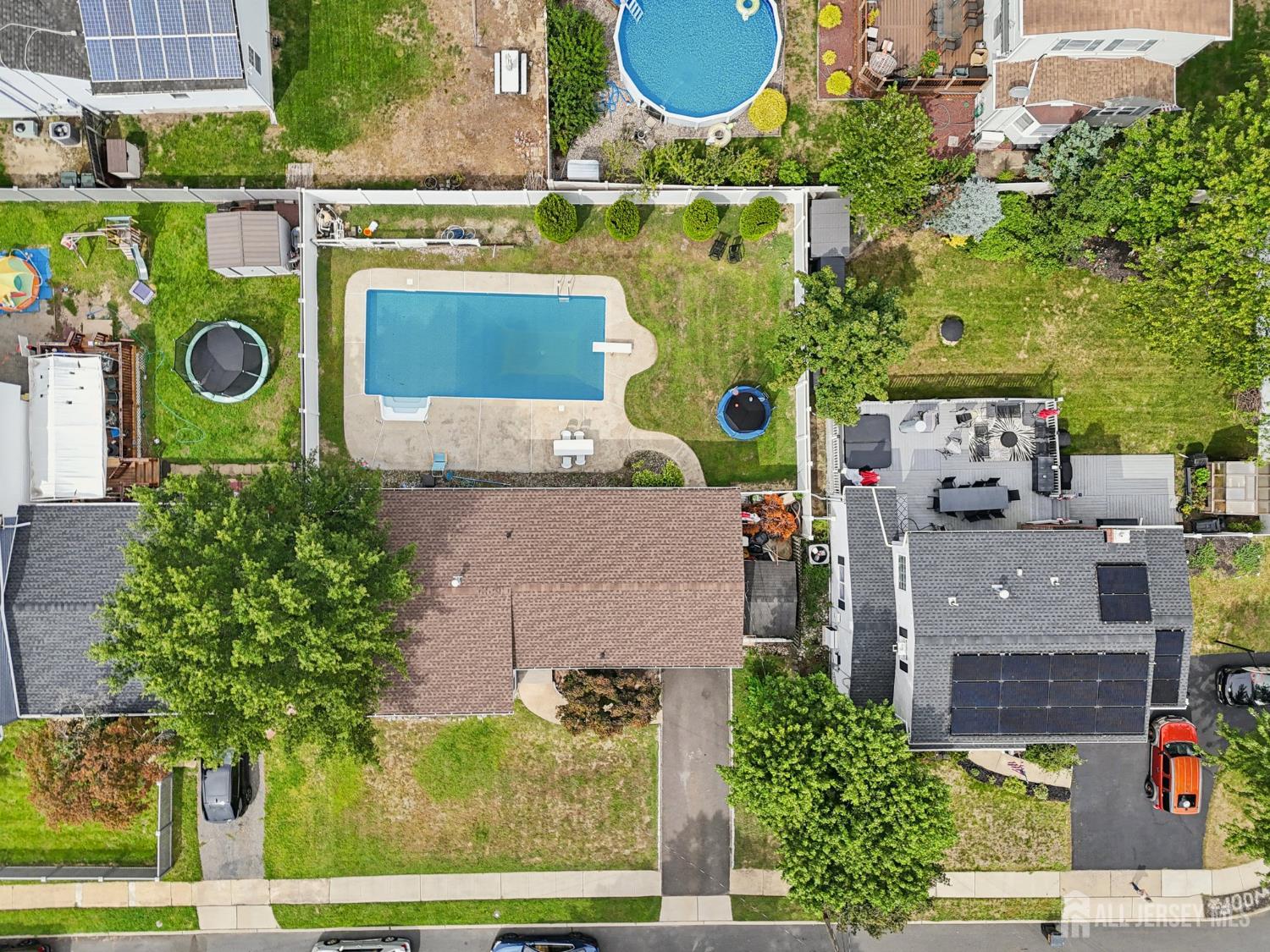 3 Duke Lane Hazlet, NJ 07730 - Photo 41 of 46 an aerial view of a house with a yard and a garage