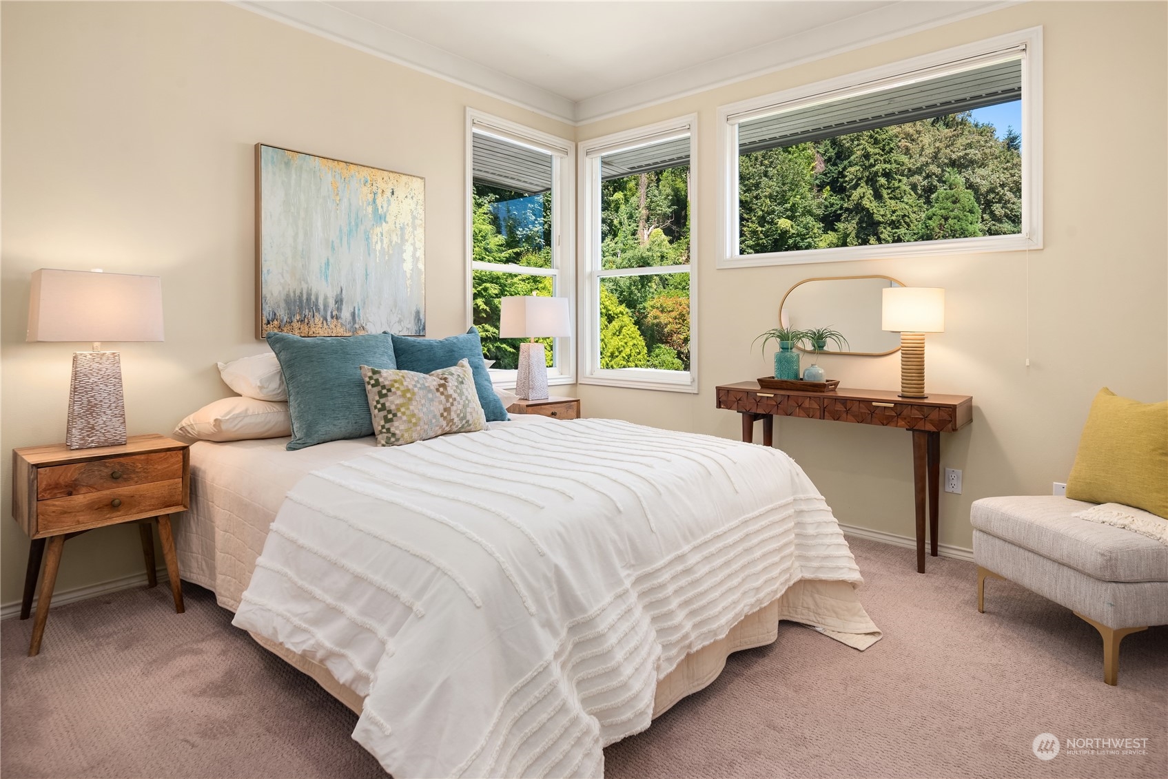 2349 Harbor Avenue Southwest, Unit 705 Seattle, WA 98126 - Photo 29 of 34 a bedroom with a bed and a lamp on table