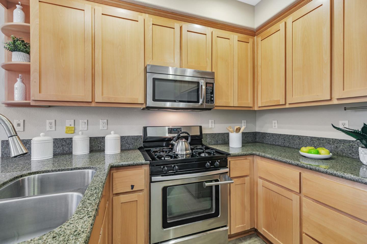 2070 Almaden Road San Jose, CA 95125 - Photo 18 of 49 a kitchen with stainless steel appliances granite countertop a sink a stove a microwave and cabinets