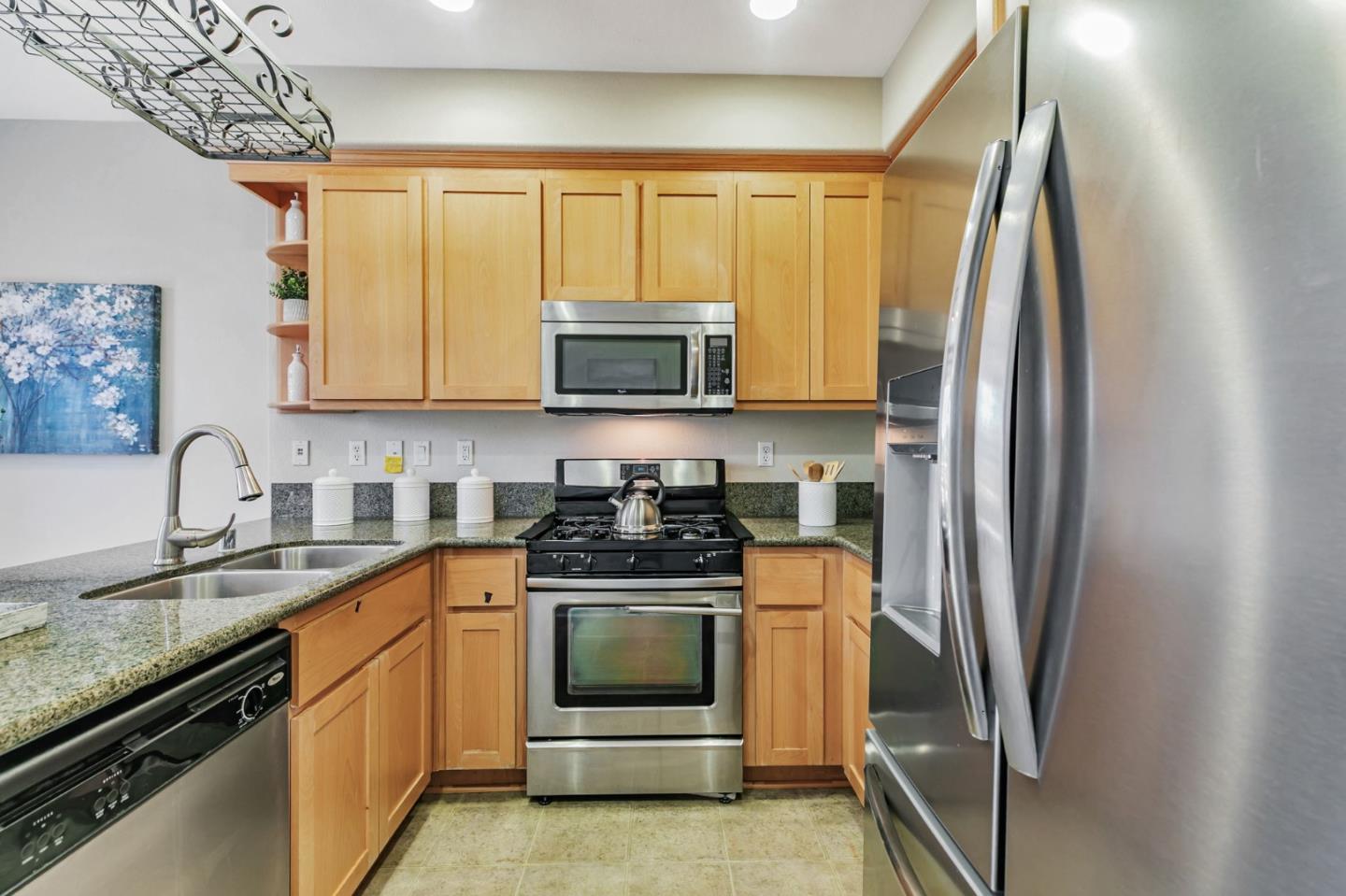 2070 Almaden Road San Jose, CA 95125 - Photo 22 of 49 a kitchen with stainless steel appliances granite countertop a stove a sink and a refrigerator