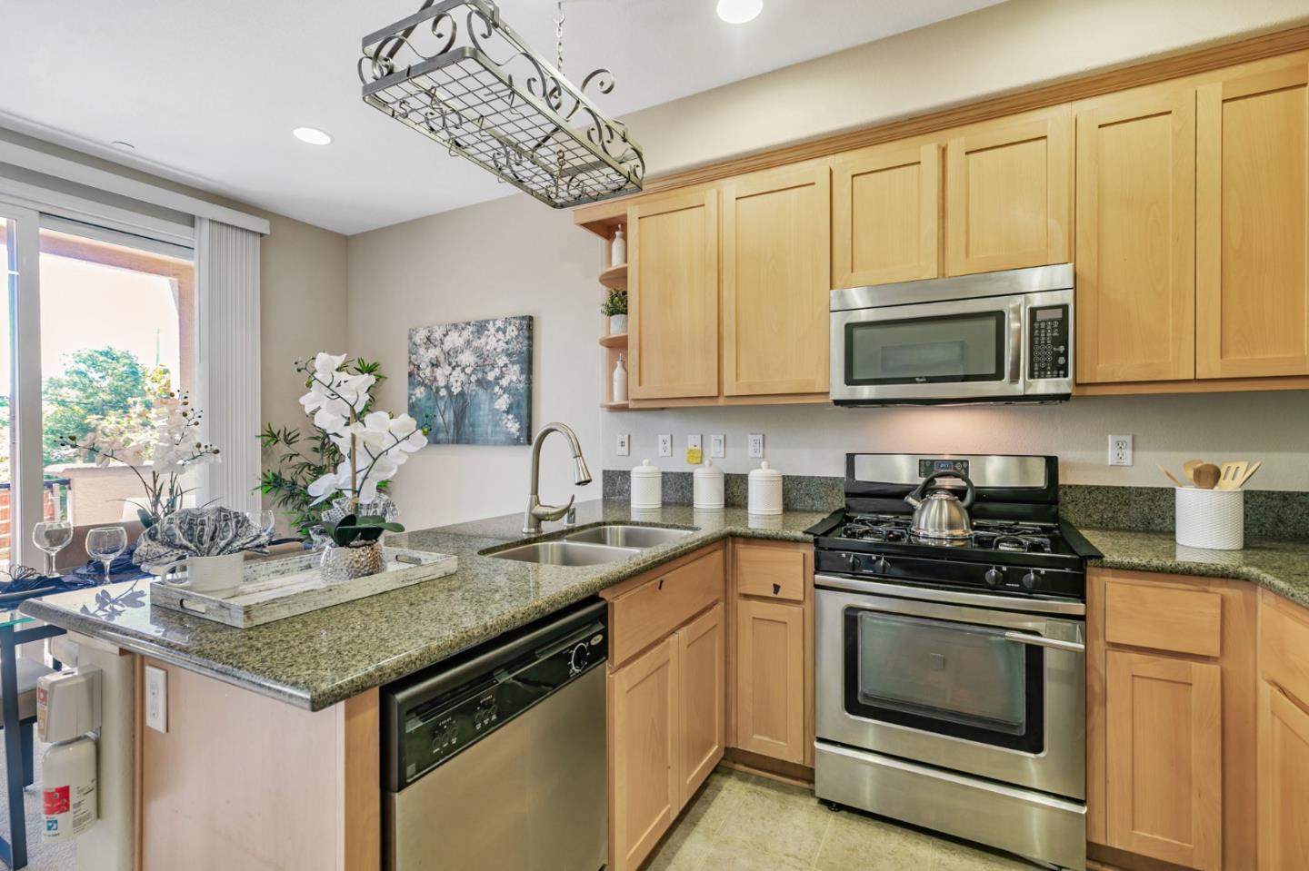 2070 Almaden Road San Jose, CA 95125 - Photo 23 of 49 a kitchen with stainless steel appliances granite countertop a sink stove and microwave