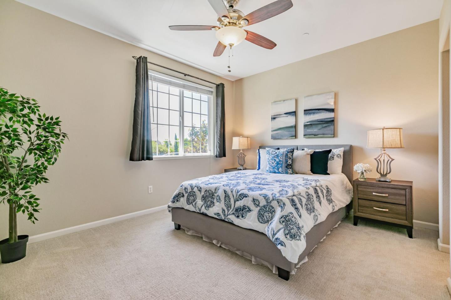 2070 Almaden Road San Jose, CA 95125 - Photo 28 of 49 a spacious bedroom with a bed and a window