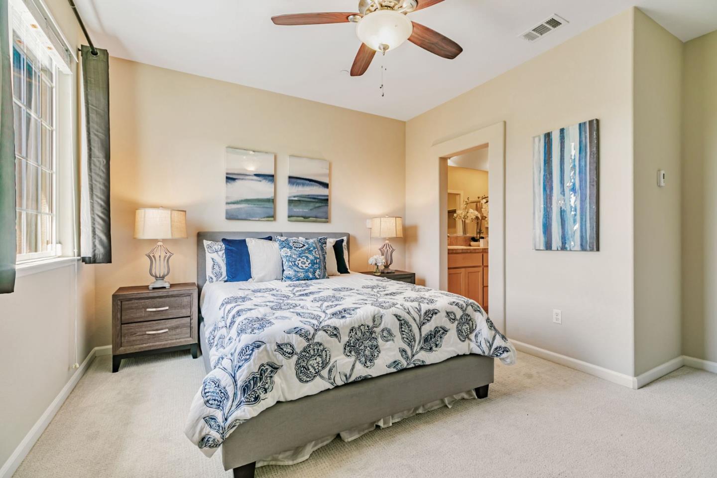 2070 Almaden Road San Jose, CA 95125 - Photo 29 of 49 a bedroom with a bed and a chandelier