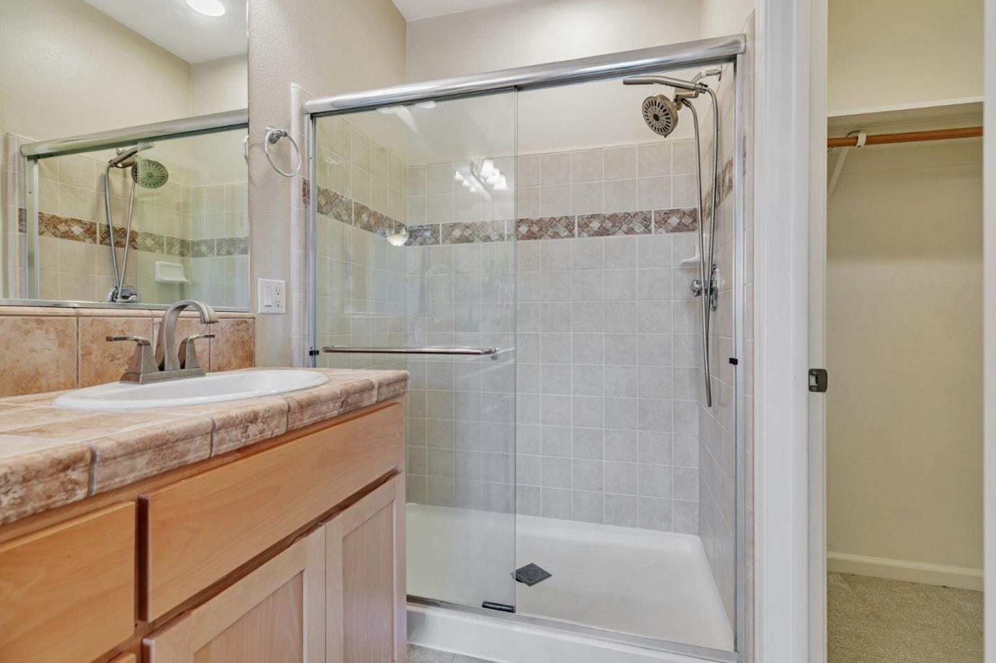 2070 Almaden Road San Jose, CA 95125 - Photo 36 of 49 a bathroom with a granite countertop sink mirror shower and a bathtub