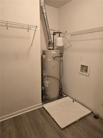 a bathroom with a sink and shower