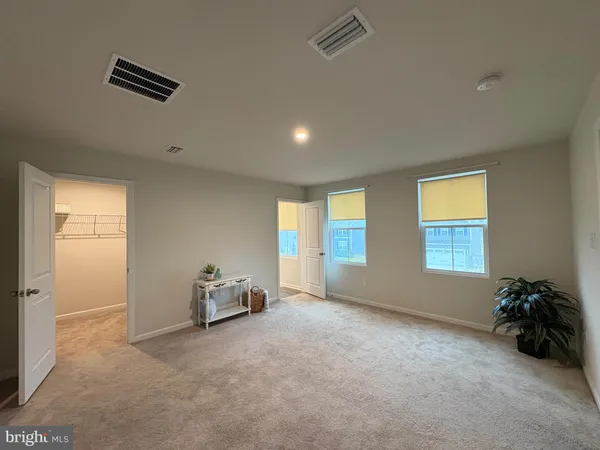 a room with furniture and a window