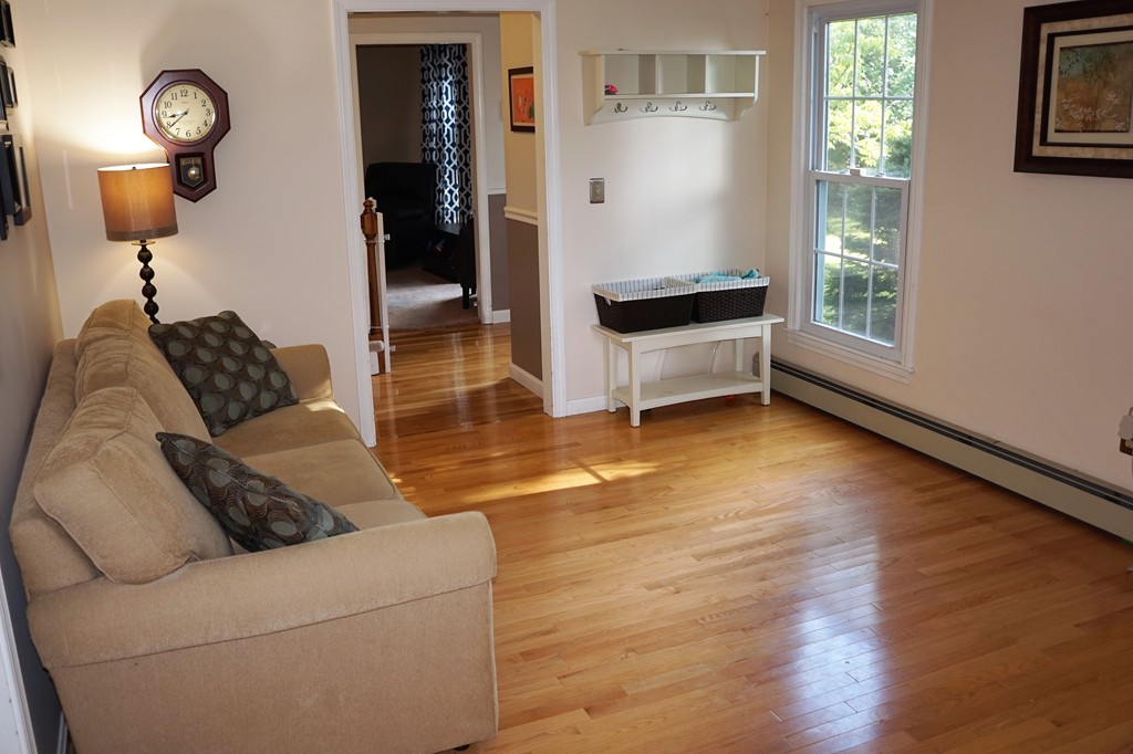 6 Pinewood Road Chelmsford, MA 01824 - Photo 13 of 27 a living room with furniture and a window