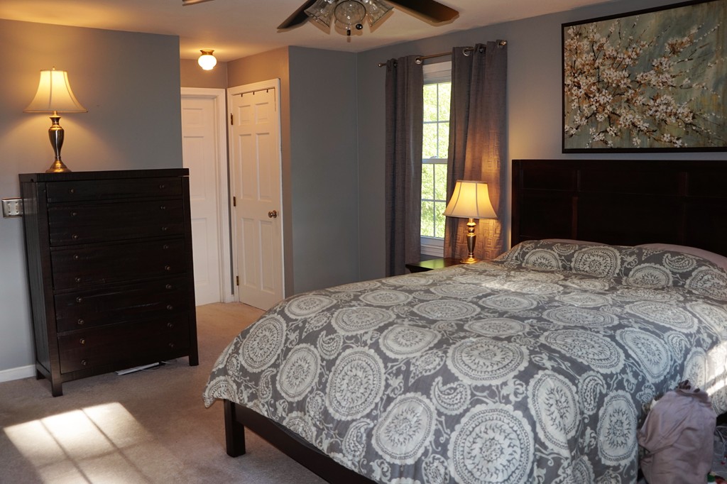 6 Pinewood Road Chelmsford, MA 01824 - Photo 17 of 27 a bedroom with a bed and a window