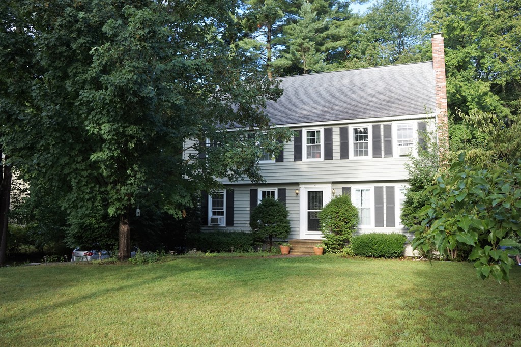6 Pinewood Road Chelmsford, MA 01824 - Photo 24 of 27 a view of a house with a yard