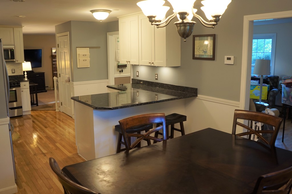 6 Pinewood Road Chelmsford, MA 01824 - Photo 5 of 27 a living room with dining table